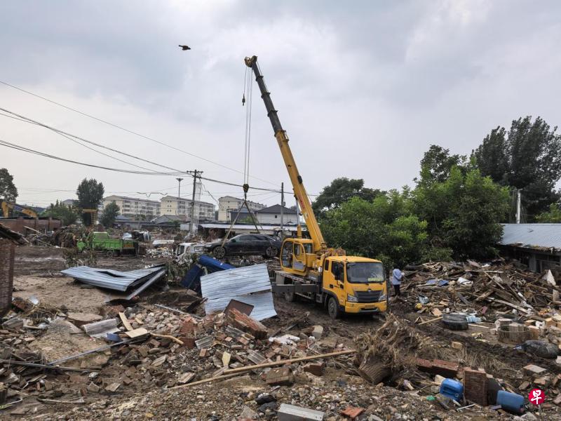 受灾严重的北京市密云区太师屯镇葡萄园村8月4日正在进行灾后清理 受灾严重的北京市密云区太师屯镇葡萄园村8月4日正在进行灾后清理